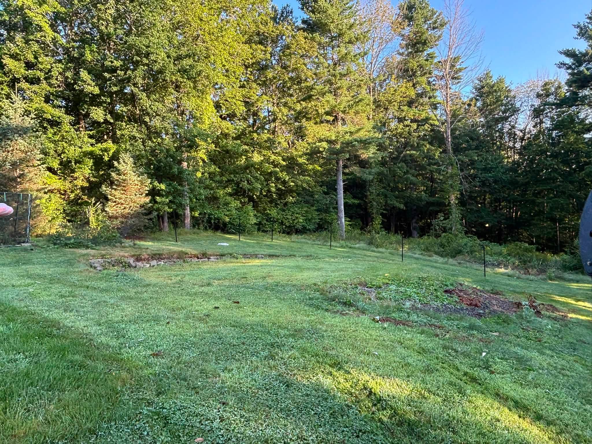 Pool base area before work begins — Spencer, MA backyard